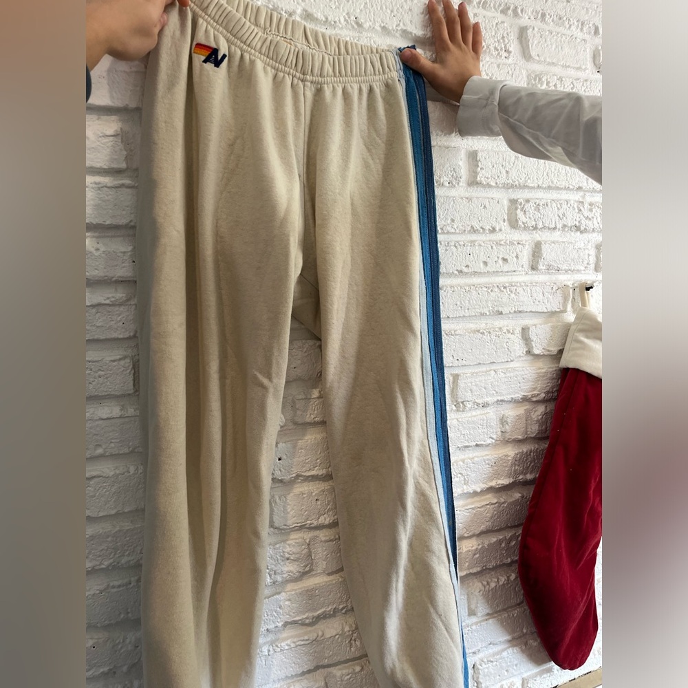 Cream Aviator Nation Sweatpants with blue stripe